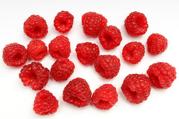 Fresh Delicious Raspberries on a White Background