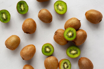 Organic Brown Kiwi Fruit, top view. Flat lay, overhead, from above.