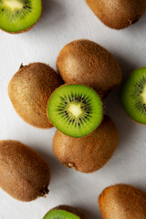 Organic Brown Kiwi Fruit, top view. Flat lay, overhead, from above.