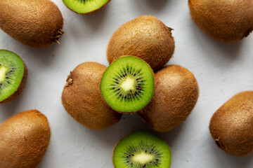 Organic Brown Kiwi Fruit, top view. Flat lay, overhead, from above.