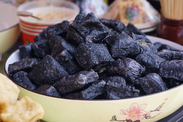 Changsha stinky tofu in Hunan is a famous snack.