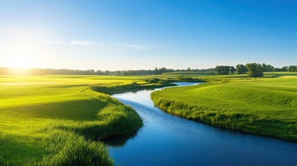 A picturesque landscape featuring lush green grass, a winding river reflecting the clear blue sky, and a sunrise illuminating the serene natural beauty of the countryside.
