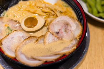 Tasty Japanese ramen with sliced pork and egg