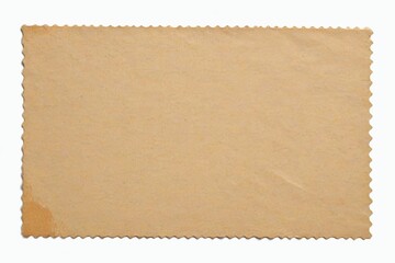 a close up of a piece of brown paper with scallop edges