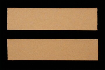 two pieces of cardboard are shown on a black background