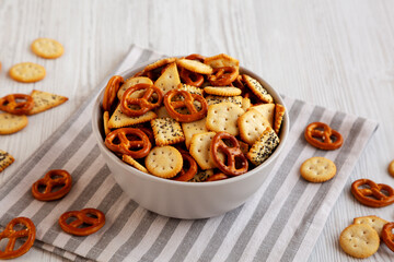 Homemade Salty Party Snack Mix in a Bowl, side view.