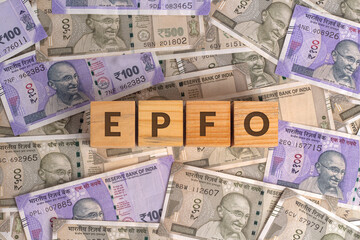 EPFO Word on Wooden Cubes with Indian Currency Background | Financial Growth Concept
