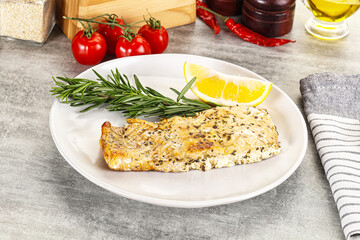 Baked salmon fish served rosemary