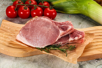 Raw pork steak loin with bone
