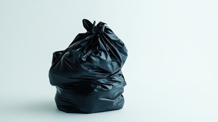 Full black garbage bag on white background. Waste disposal concept