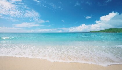 serene tropical beach with crystal clear turquoise water and white sand under a blue sky, ideal for travel promotions