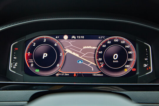 Dashboard screen with navigation on the car control panel, speedometer, fuel level and engine temperature level