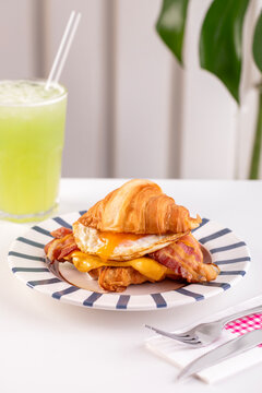 Breakfast table, Croissant and Coffee served on a restaurant table