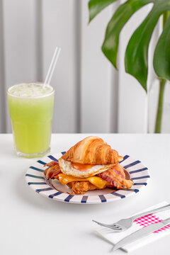 Breakfast table, Croissant and Coffee served on a restaurant table