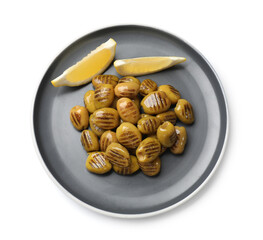 Grilled green olives and lemon wedges isolated on white, top view
