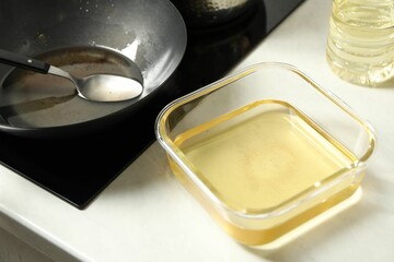 Used cooking oil in kitchen, closeup view