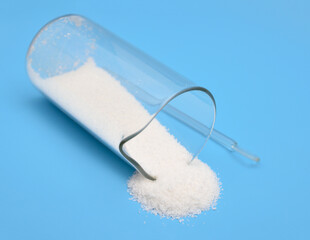 Alkylbenzene sulfonates powder on blue background