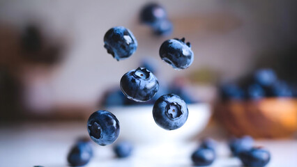 Mesmerizing macro shot of juicy blueberries with levitating effect on a blurred background in a kitchen in warm colors