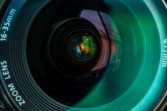 Macro camera lens,Close-up camera lens,Photo Camera or Video lens close-up on black background, objective, concept of photographer camera man job, looking for a photographer, 