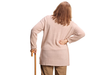 Rear view shot of an elderly woman in pain holding lower back