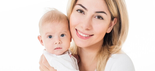 Mother and baby playing and smiling. Happy family.