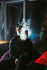 A person fully immersed in a relaxed and tranquil setting, surrounded by swirling smoke and soft...