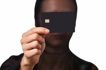 Internet thief in black mask holding black credit card in hand