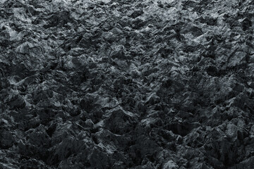 The rock stones background. Dark grey surface with grunge mineral abstract pattern, 3d render