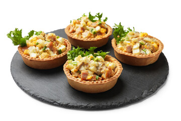 Tartlets with delicious filling isolated on white
