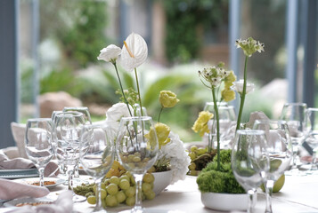 light and airy floral and fruit tablescape at high end wedding reception