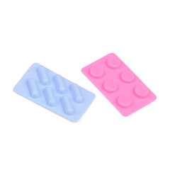Plastic artificial medicines for children's doctor game on a white background.