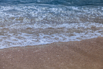 waves, sand and ocean shoreline