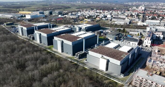 Data center space, Frankfurt 4 Data Center, housing IT and network systems, AI and cloud computing. Aerial views.
