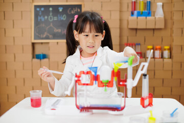 A young girl was conducting a science experiment at home.