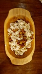 halusky served on the wooden plate