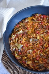 rice paella with artichokes and vegetables