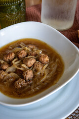 soup dish with meatballs and onions, homemade recipe