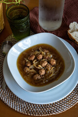 soup dish with meatballs and onions, homemade recipe