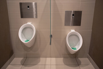 Urinals in public bathrooms
