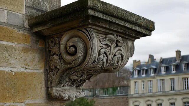 Architectural detail showcases intricate stonework and historic charm in urban Paris