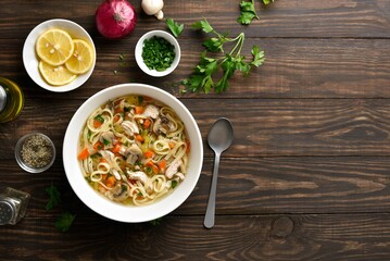 Diet chicken noodle soup with vegetables