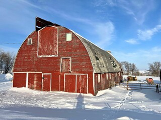 An old round barn still holding its shape in the cold winter