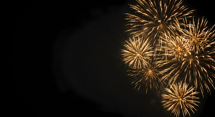 Obraz premium Bright fireworks exploding on a rich black background, leaving plenty of room for text, generative ai