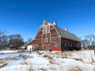 The old barn still keeps watch over the grounds of the farm it once serviced