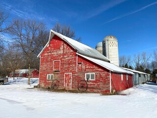 An old saltbox shape and style barn reminds us of what once existed