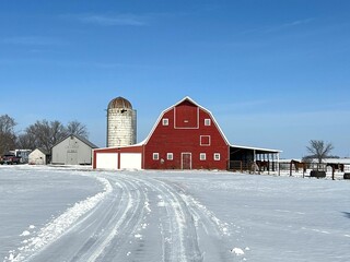Another iconic snow scene with vintage red barn