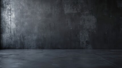 A dark, textured wall meets a polished concrete floor, creating a moody and industrial atmosphere perfect for photography or artistic displays.