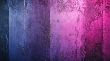 Obraz premium A textured wall blending shades of blue and vibrant pink, creating a striking backdrop that evokes creativity and modernity.