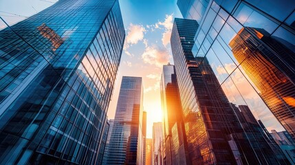 A panoramic view of a bustling financial district at sunset, showcasing corporate buildings.