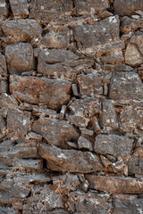 Ancient wall texture background with old concrete bricks